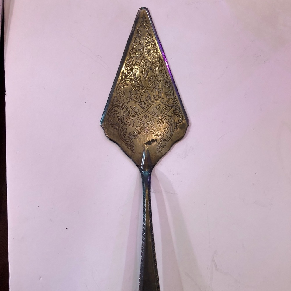- Vintage Silver Plated Pie Utensil.